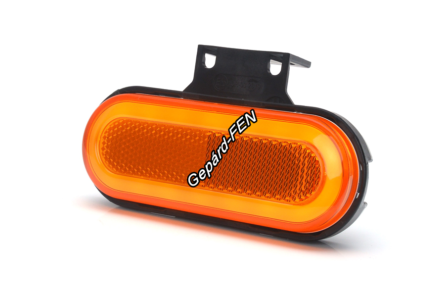 W198,-as tipuscsalád.1399. Oldalswó (sárga ) ovális alakú NEON Led,-es helyzetjelzõ lámpa, prizmával, felfogatási adapterrel.12-24V,-os kivitel.Vízállóság: IP6K9K. Méretei: 124X68X42mm. 25 cm vezetékkel.